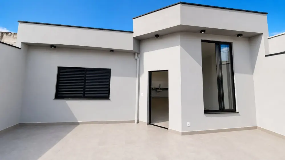 Área externa integrada com entrada para a cozinha